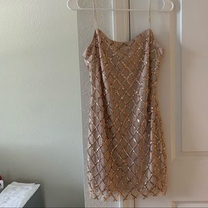 Rose gold sparkly mini dress.